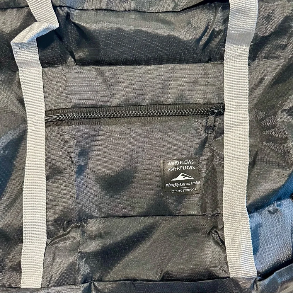 Black Foldable Travel Duffel Bag with Gray Straps